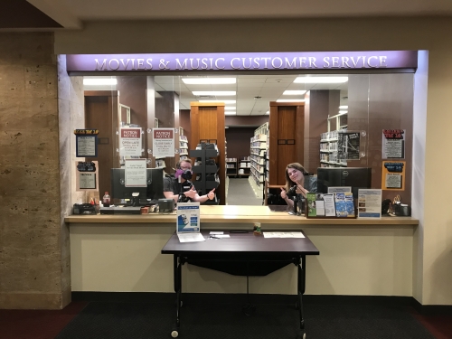 two staff members at the vault desk
