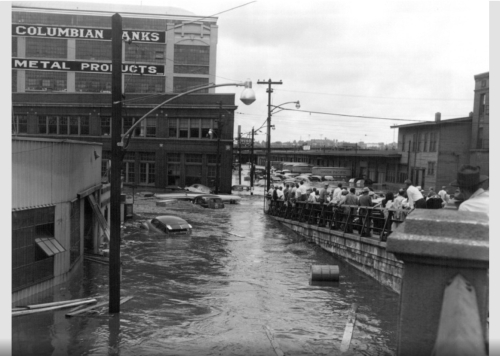 West Bottoms workers gather at the foot of 12th Street Viaduct, July 13, 1951.