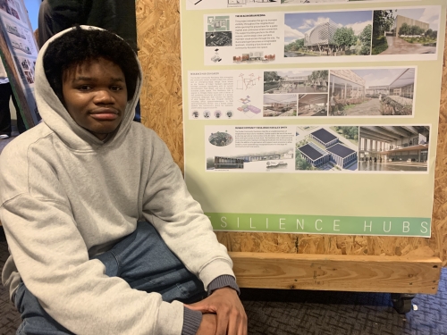 boy next to display