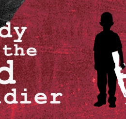 silhouette of man with machine gun