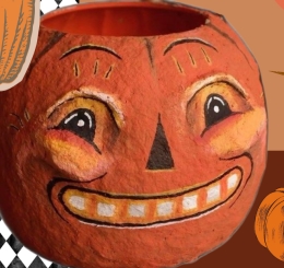 carved jack-o-lanterns on table