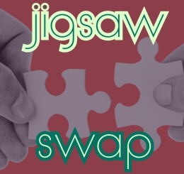 hands with pieces of puzzle about to lock together