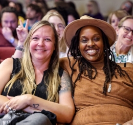 two women smiling