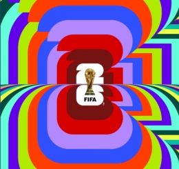 rainbow colors surrounding the FIFA World Cup trophy