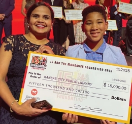 The Library’s chief operating officer, Pritha Hariharan, and her son Jai received a donation for Summer Reading 2025 from the 15 and the Mahomies Foundation.