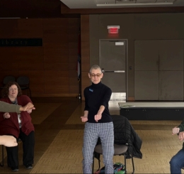 group of people doing moving meditation