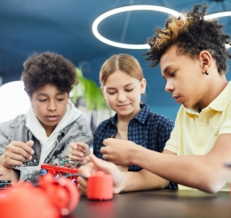 3 children working with wires