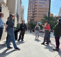 A group of Library staffers gathers for an Urban Hike outside the Central Library.