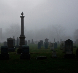 Signature event and a photo of a cemetery