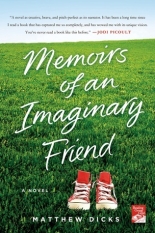The cover of Memoirs of an Imaginary Friend has mostly green grass, with a hint of blue sky at the top and a pair of red converse shoes