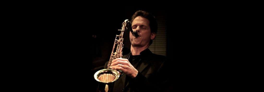 man playing saxophone