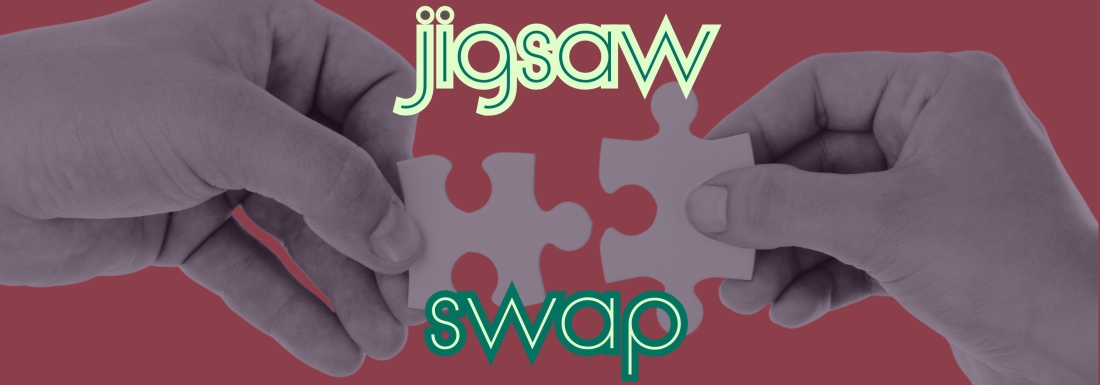 hands with pieces of puzzle about to lock together