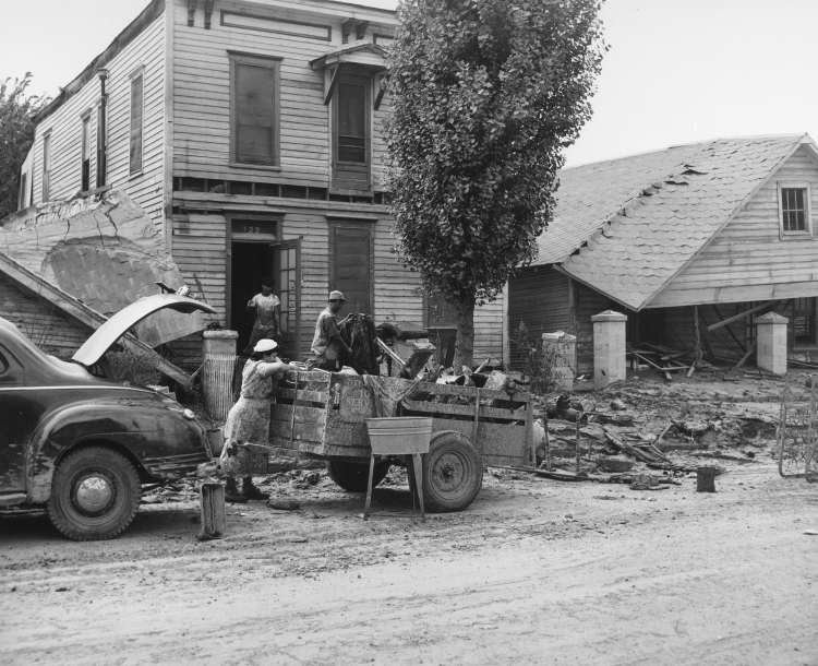 The Balderas family salvages items from their flood-damaged home in Armourdale, Kansas.
