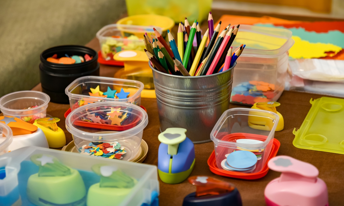Craft supplies laid out on a table