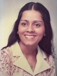 high school yearbook photo of woman with dark hair