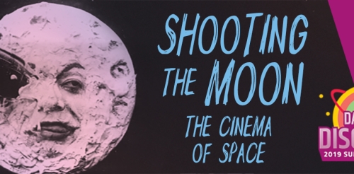 moon with face and object in eye