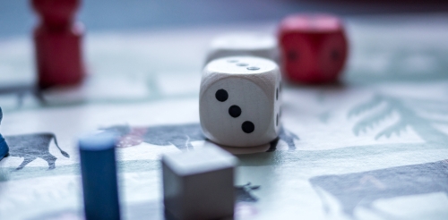 game pieces and die