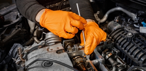 person working on vehicle